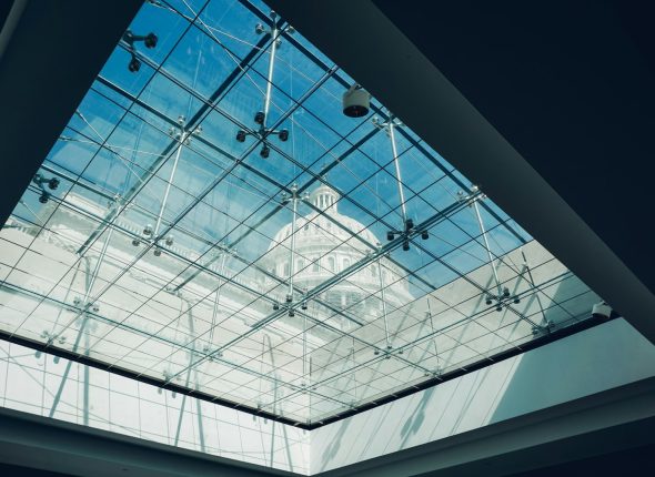 low angle photography of glass building