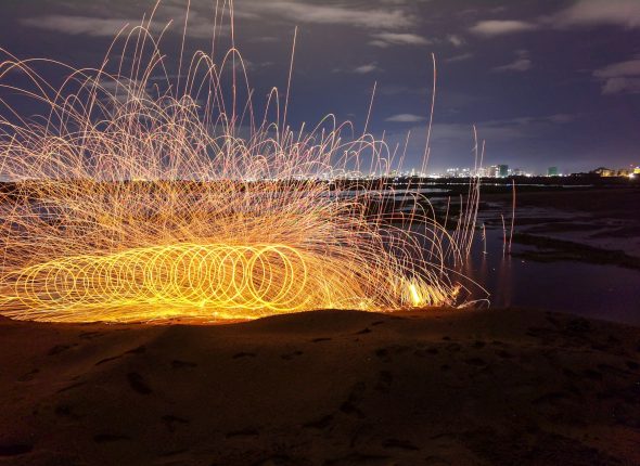 a group of fireworks at night